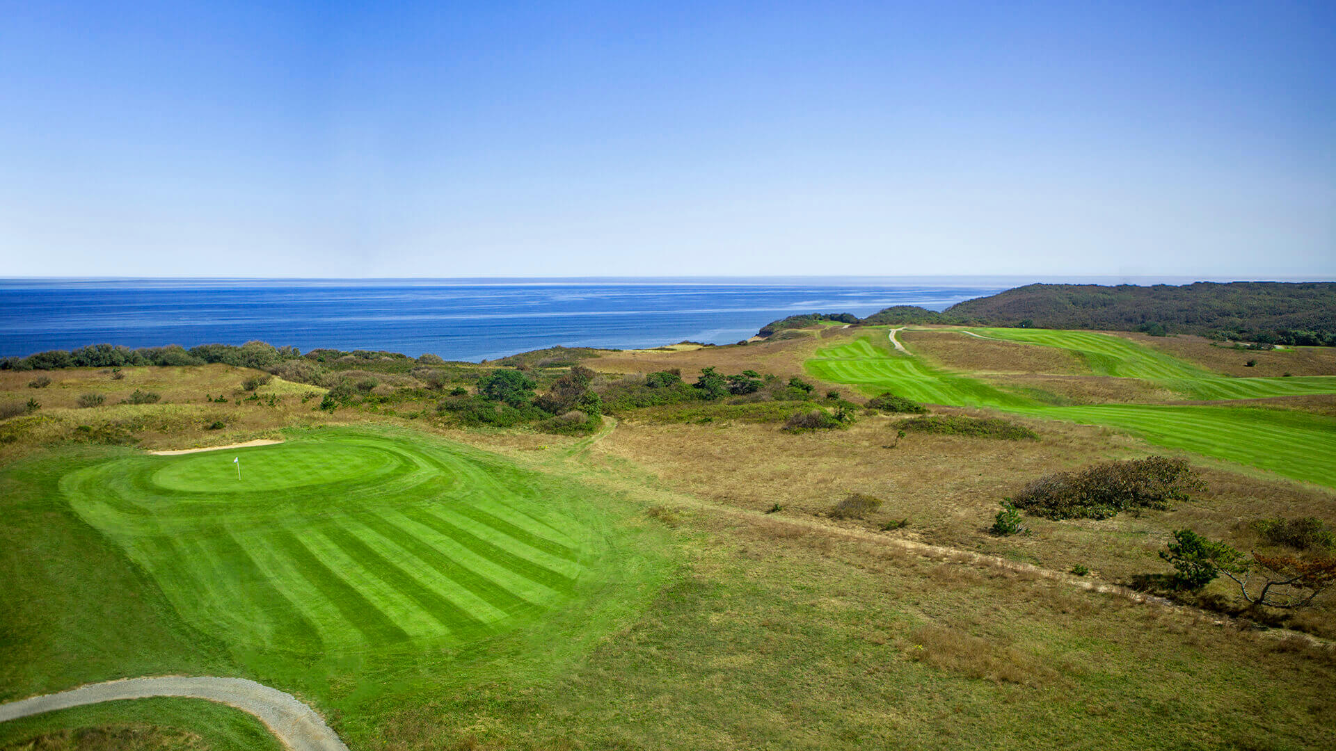Highland Links greens and natural rough above the Atlantic in North Truro