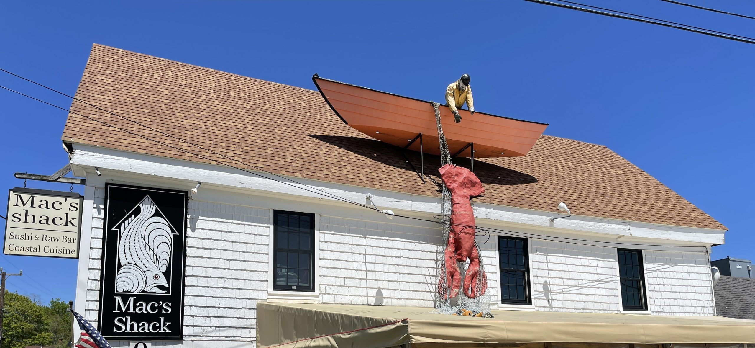 Mac’s Shack in Wellfleet, with its fisherman and boat sculpture above the entrance