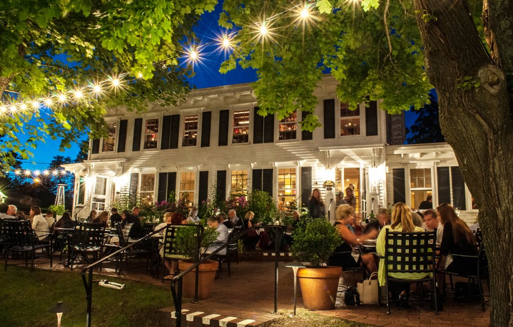 Outdoor tables and string lights at Winslow’s Tavern in Wellfleet